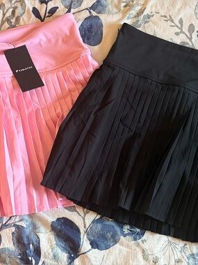 Fabletics Pleated Mini Skirt Duo in Pink and Black
